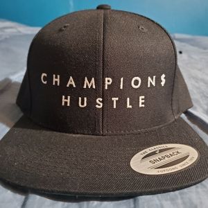 Champions hustle snapback hat